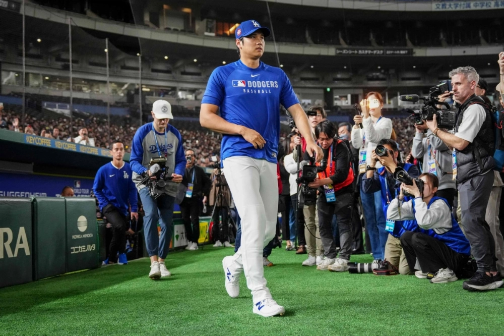Dodgers superstar Shohei Ohtani arrives for practice on Friday at Tokyo Dome. Dodgers superstar Shohei Ohtani arrives for practice on Friday at Tokyo Dome.