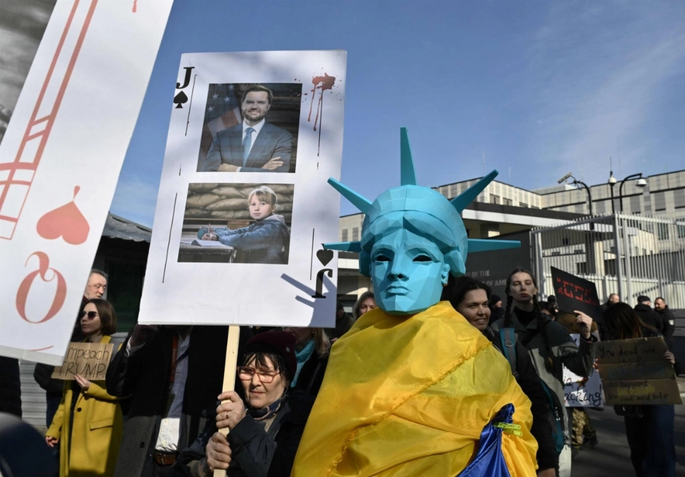 A protest called "America, wake up" is held in front of the U.S. Embassy in Kyiv on March 8, days after U.S. President Donald Trump paused American military and intelligence support for Ukraine. A protest called "America, wake up" is held in front of the U.S. Embassy in Kyiv on March 8, days after U.S. President Donald Trump paused American military and intelligence support for Ukraine.
