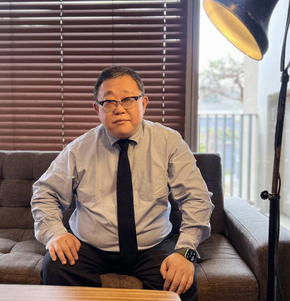 Tetsu Okumura, former emergency room physician at St. Luke's International Hospital, talks about how he treated the victims of the sarin gas attack on the Tokyo subway system 30 years ago, during an interview last week. Tetsu Okumura, former emergency room physician at St. Luke's International Hospital, talks about how he treated the victims of the sarin gas attack on the Tokyo subway system 30 years ago, during an interview last week.