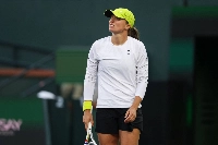 Poland's Iga Swiatek reacts while playing against Russia's Mirra Andreeva during their women's singles semi-final tennis match at the BNP Paribas Open at the Indian Wells Tennis Garden on March 14.  | AFP-JIJI