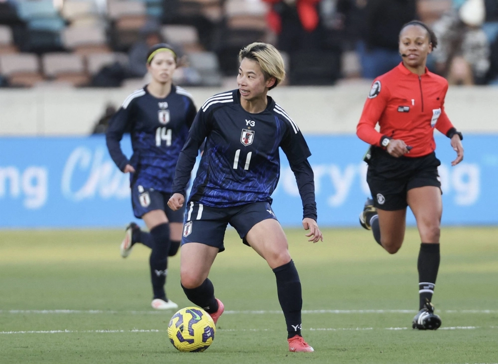Japan forward Mina Tanaka dribbles during a SheBelieves Cup match against Australia in Houston on Feb. 20. Japan forward Mina Tanaka dribbles during a SheBelieves Cup match against Australia in Houston on Feb. 20.