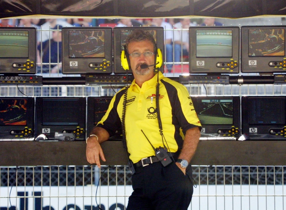 Eddie Jordan sits on the pitwall of the Montmelo circuit near Barcelona, Spain, during a practice on April 26, 2002. Eddie Jordan sits on the pitwall of the Montmelo circuit near Barcelona, Spain, during a practice on April 26, 2002.