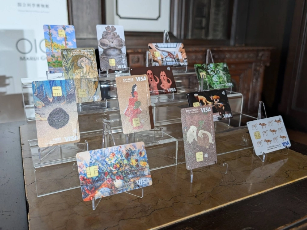 Marui Group's Museum Epos Cards — where donations are made to art museums based on the amount spent on the card — sit on display in Tokyo's Taito Ward on Friday. Marui Group's Museum Epos Cards — where donations are made to art museums based on the amount spent on the card — sit on display in Tokyo's Taito Ward on Friday.
