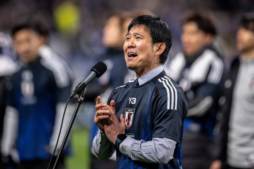 Japan head coach Hajime Moriyasu gives a speech after his team clinched a spot in the 2026 World Cup with a win over Bahrain on Thursday in Saitama.  Japan head coach Hajime Moriyasu gives a speech after his team clinched a spot in the 2026 World Cup with a win over Bahrain on Thursday in Saitama.