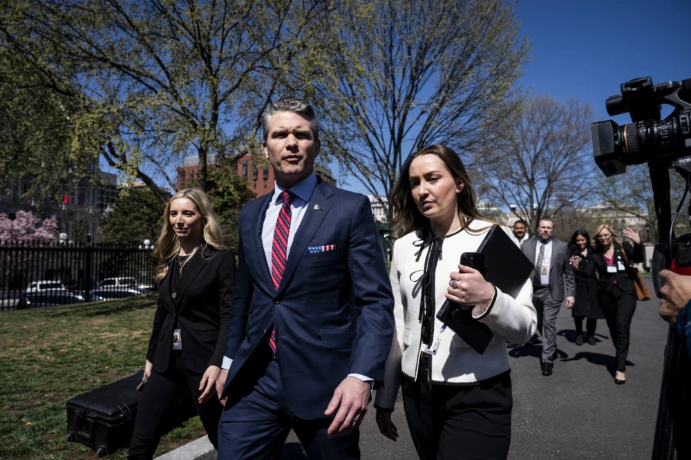 Defense Secretary Pete Hegseth walks to the West Wing of the White House on March 21. Hegseth disclosed war plans in an encrypted chat group that included a journalist two hours before U.S. troops launched attacks against the Houthi militia in Yemen, the White House said on Monday. Defense Secretary Pete Hegseth walks to the West Wing of the White House on March 21. Hegseth disclosed war plans in an encrypted chat group that included a journalist two hours before U.S. troops launched attacks against the Houthi militia in Yemen, the White House said on Monday.