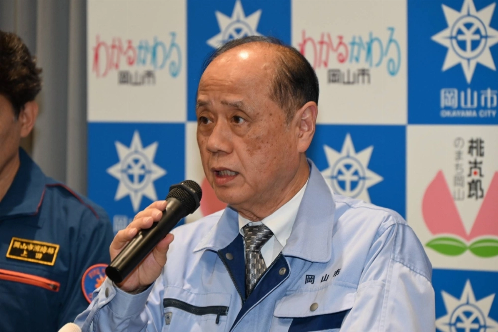 Masao Omori, mayor of the city of Okayama, the capital of the western prefecture of the same name, announces that a wildfire there had been contained Friday. Masao Omori, mayor of the city of Okayama, the capital of the western prefecture of the same name, announces that a wildfire there had been contained Friday.