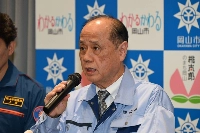 Masao Omori, mayor of the city of Okayama, the capital of the western prefecture of the same name, announces that a wildfire there had been contained Friday. | JIJI