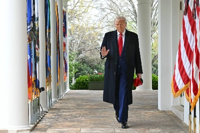 U.S. President Donald Trump waves as he walks to deliver remarks on reciprocal tariffs during an event in the Rose Garden entitled "Make America Wealthy Again" at the White House in Washington on Wednesday. U.S. President Donald Trump waves as he walks to deliver remarks on reciprocal tariffs during an event in the Rose Garden entitled "Make America Wealthy Again" at the White House in Washington on Wednesday.