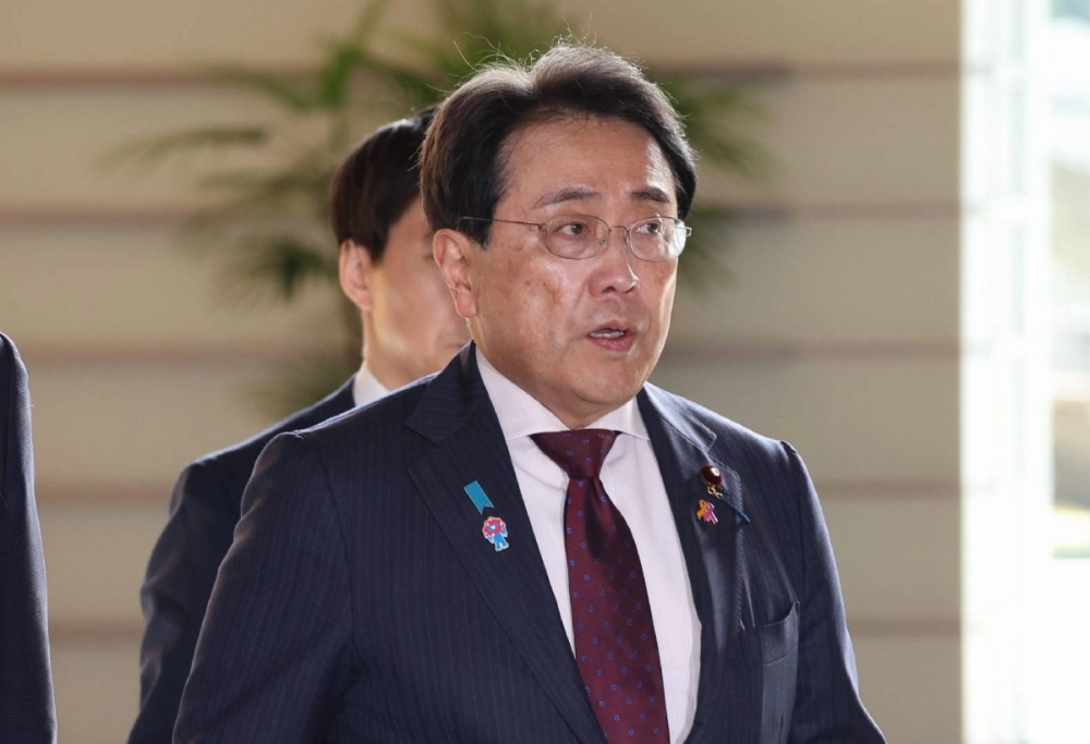 Economic revitalization minister Ryosei Akazawa enters the Prime Minister's Office in Tokyo on Tuesday. Economic revitalization minister Ryosei Akazawa enters the Prime Minister's Office in Tokyo on Tuesday.