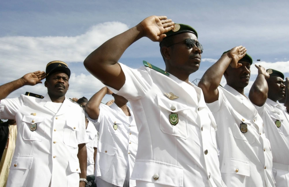 Military officers salute in Moroni, Comoros. Several African nations fear that Washington is losing interest in their affairs and may withdraw hundreds of millions of dollars in annual security assistance.  Military officers salute in Moroni, Comoros. Several African nations fear that Washington is losing interest in their affairs and may withdraw hundreds of millions of dollars in annual security assistance.