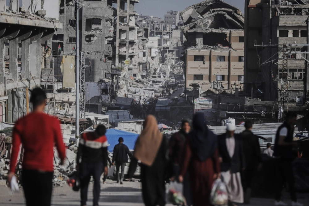 Displaced Palestinians flee the Shejaiya district, east of Gaza City, on April 3. Displaced Palestinians flee the Shejaiya district, east of Gaza City, on April 3.