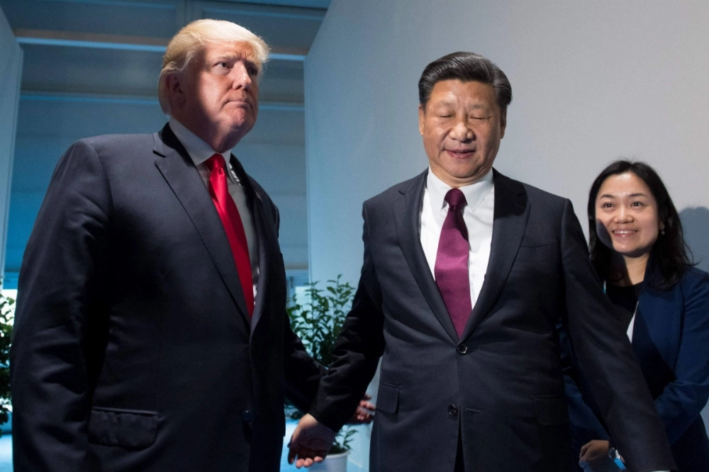 U.S. President Donald Trump and Chinese leader Xi Jinping arrive prior to a meeting on the sidelines of the Group of 20 Summit in Hamburg, Germany, in July 2017. U.S. President Donald Trump and Chinese leader Xi Jinping arrive prior to a meeting on the sidelines of the Group of 20 Summit in Hamburg, Germany, in July 2017.