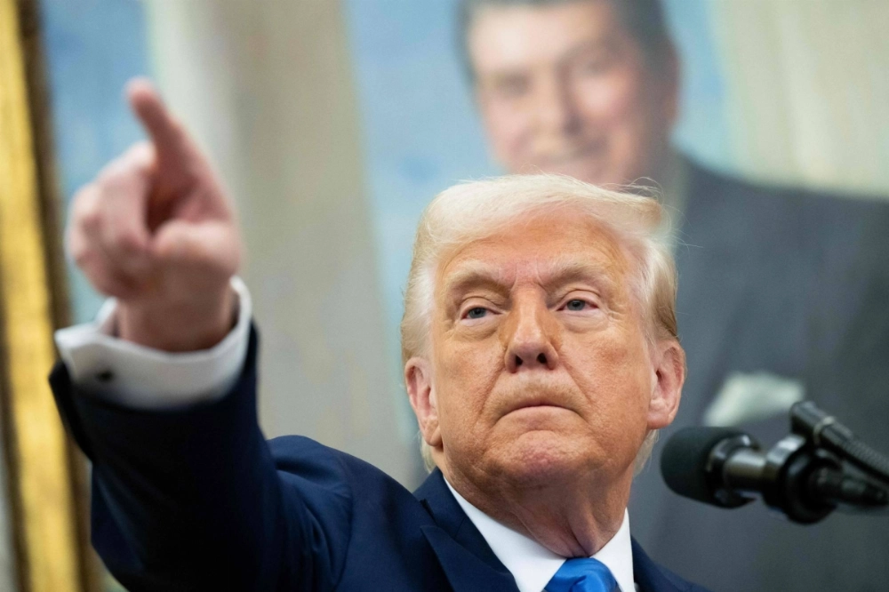 U.S. President Donald Trump speaks during a ceremony in the Oval Office of the White House in Washington on March 28. U.S. President Donald Trump speaks during a ceremony in the Oval Office of the White House in Washington on March 28.