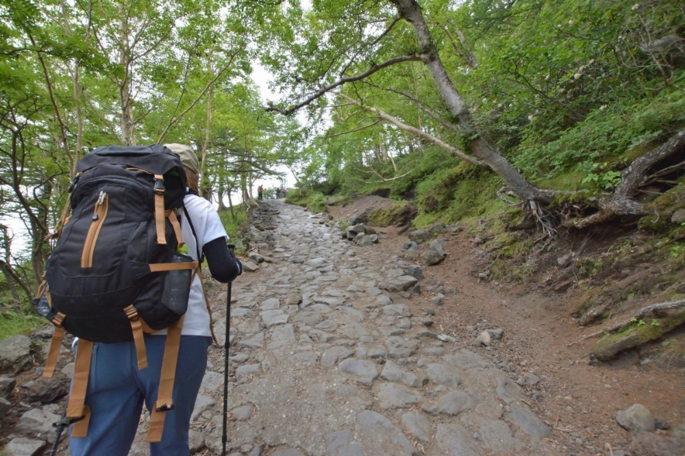 The reservation system is aimed at reducing congestion and preventing people from climbing Japan's tallest mountain in casual clothes. The reservation system is aimed at reducing congestion and preventing people from climbing Japan's tallest mountain in casual clothes.