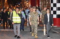 U.S. military personnel join Japanese officials and residents for a one-off joint nighttime patrol on the streets of the city of Okinawa, in Okinawa Prefecture, late Friday in the first such joint operation since 1973, following sexual assault cases involving U.S. servicemen.  | AFP-JIJI