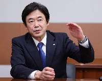 KDDI President and CEO Hiromichi Matsuda is interviewed in Tokyo last week. | Jiji
