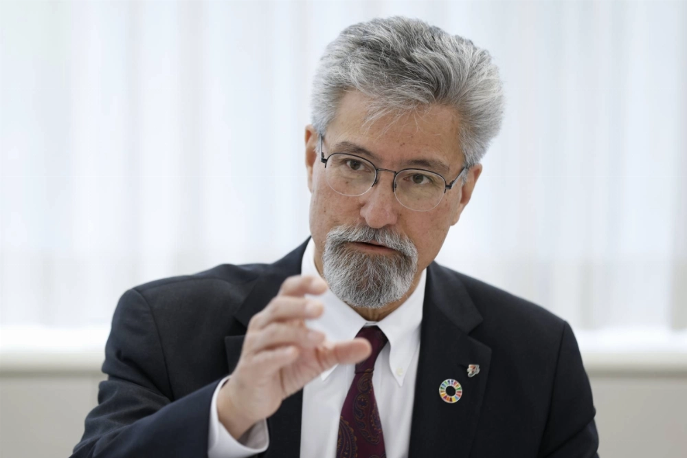 Stephen Dacus, incoming chief executive officer of Seven & I Holdings, speaks during an interview at the company's headquarters in Tokyo on Friday. Dacus plans to boost investments in its U.S. stores using cash from a planned listing of its American retail operations. Stephen Dacus, incoming chief executive officer of Seven & I Holdings, speaks during an interview at the company's headquarters in Tokyo on Friday. Dacus plans to boost investments in its U.S. stores using cash from a planned listing of its American retail operations.
