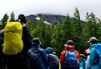 Climbers gather on the first day of the climbing season on the Yoshida Trail at the fifth station on the slopes of Mount Fuji in Fujiyoshida, Yamanashi Prefecture, on July 1, 2024. | Reuters