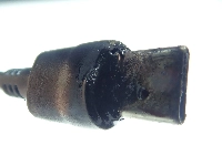 A USB-type charging connector of a laptop was burned during charging due to foreign objects also being in the charging port. | National Institute of Technology and Evaluation / via jiji