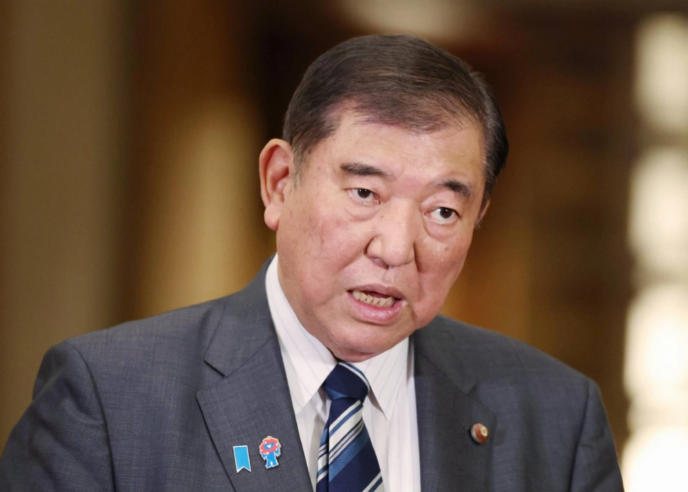 Prime Minister Shigeru Ishiba speaks to reporters about Japan-U.S. tariff negotiations at his official residence on Saturday. Prime Minister Shigeru Ishiba speaks to reporters about Japan-U.S. tariff negotiations at his official residence on Saturday.