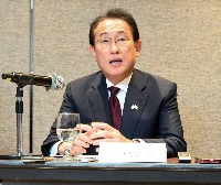 Former Prime Minister Fumio Kishida speaks during a news conference in Kuala Lumpur on Tuesday. | Jiji
