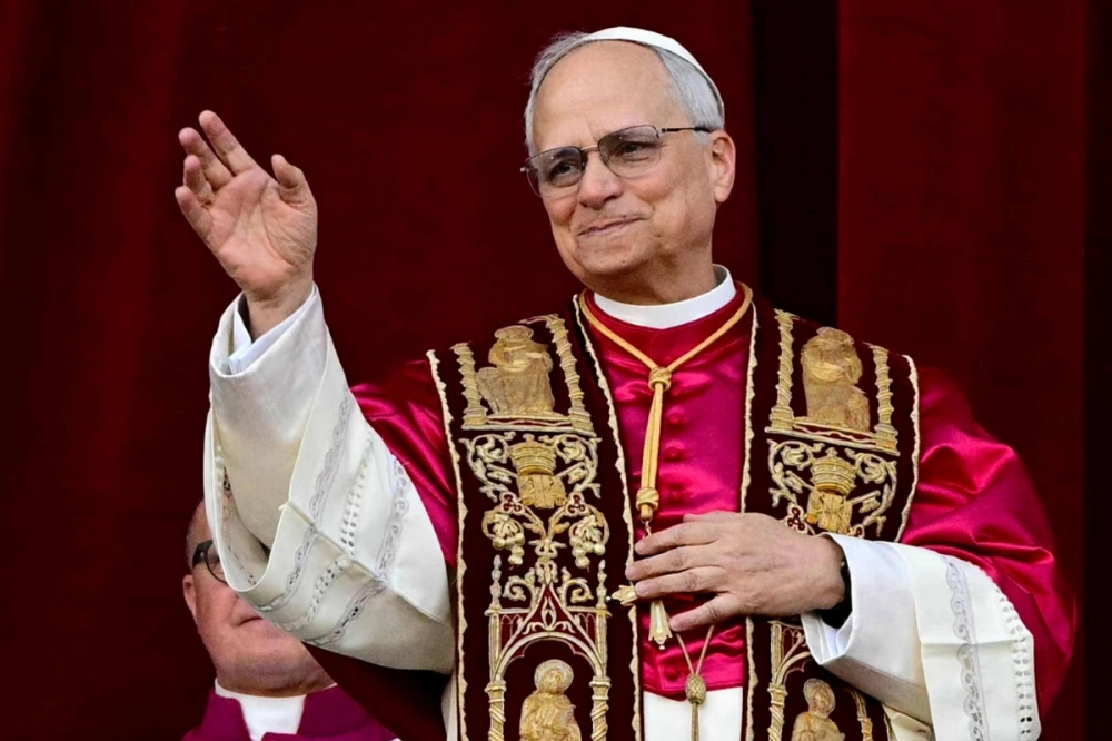Newly elected Pope Leo XIV, Robert Prevost waves from the main central loggia balcony of the St Peter's Basilica, after the cardinals ended the conclave, in The Vatican, on Thursday. Newly elected Pope Leo XIV, Robert Prevost waves from the main central loggia balcony of the St Peter's Basilica, after the cardinals ended the conclave, in The Vatican, on Thursday.
