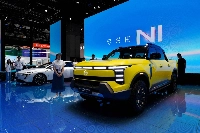 A Nissan plug-in hybrid truck at the Shanghai Auto Show last month. Nissan is looking to invest in its China operations and use the nation’s intensely competitive market to accelerate its development of electric vehicles. | Bloomberg