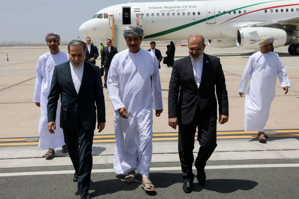 Iranian Foreign Minister Abbas Araghchi (left) arrives in Muscat, Oman, on Sunday for nuclear talks with the U.S. Iranian Foreign Minister Abbas Araghchi (left) arrives in Muscat, Oman, on Sunday for nuclear talks with the U.S.