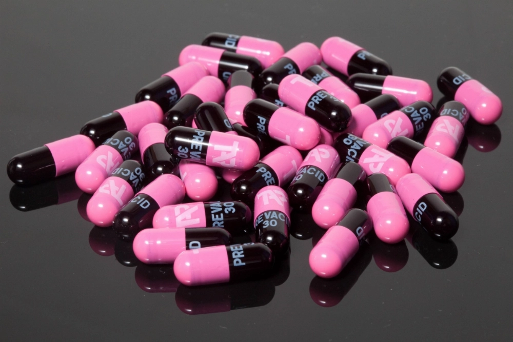 Capsules of Takeda Pharmaceutical's Prevacid heartburn drug. The company's share price dropped by over 5% on Monday after U.S. President Donald Trump announced a plan to order a cut in U.S. prescription drug costs. Capsules of Takeda Pharmaceutical's Prevacid heartburn drug. The company's share price dropped by over 5% on Monday after U.S. President Donald Trump announced a plan to order a cut in U.S. prescription drug costs.
