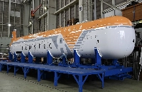 The deep sea explorer Urashima 8000 is unveiled Monday at the Japan Agency for Marine-Earth Science and Technology in Yokosuka, Kanagawa Prefecture. | Jiji