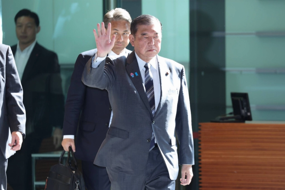 Prime Minister Shigeru Ishiba enters his office in Tokyo on Tuesday. Prime Minister Shigeru Ishiba enters his office in Tokyo on Tuesday.