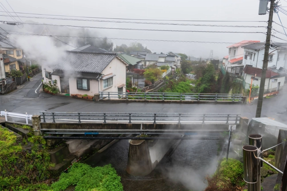 Houses along canal with heavy steam and mist in Beppu, Oita Prefecture. The Meteorological Agency announced the arrival of rainy season in the southern part of the Kyushu region, making it the first time the season began in the area before any other region since records began in 1951. Houses along canal with heavy steam and mist in Beppu, Oita Prefecture. The Meteorological Agency announced the arrival of rainy season in the southern part of the Kyushu region, making it the first time the season began in the area before any other region since records began in 1951.
