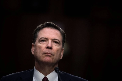 Ousted FBI Director James Comey listens during a hearing before the Senate Select Committee on Intelligence on Capitol Hill in Washington in June 2017. Ousted FBI Director James Comey listens during a hearing before the Senate Select Committee on Intelligence on Capitol Hill in Washington in June 2017.