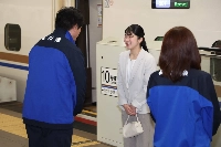 Princess Aiko is greeted by Ishikawa Gov. Hiroshi Hase (left) at the Kanazawa Station on Sunday. | Jiji