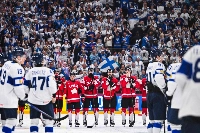 Canada's players react to their defeat at the end of an IIHF Men's Ice Hockey World Championship match against Finland in Stockholm on Monday.  | AFP-JIJI