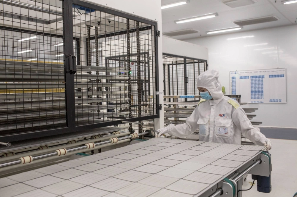 A worker handles photovoltaic cells at Irex Energy JSC's manufacturing facility in Vung Tau, Vietnam, on July 15, 2019. The U.S. International Trade Commission has concluded that solar cells and modules imported from Cambodia, Malaysia, Thailand and Vietnam injure the domestic industry.  A worker handles photovoltaic cells at Irex Energy JSC's manufacturing facility in Vung Tau, Vietnam, on July 15, 2019. The U.S. International Trade Commission has concluded that solar cells and modules imported from Cambodia, Malaysia, Thailand and Vietnam injure the domestic industry.