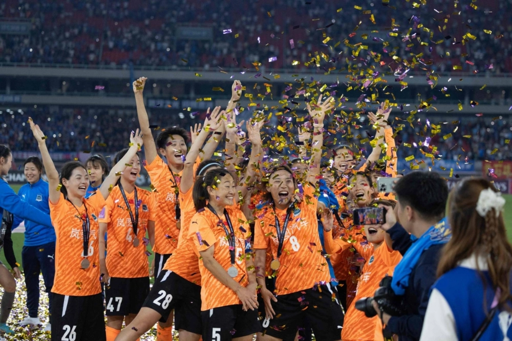 Wuhan Jiangda players celebrate their victory over Melbourne City in the final of the AFC Women's Champions League in Wuhan, China, on Saturday.  Wuhan Jiangda players celebrate their victory over Melbourne City in the final of the AFC Women's Champions League in Wuhan, China, on Saturday.
