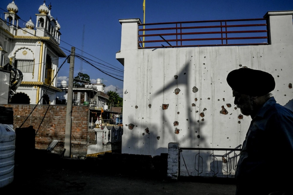 A house damaged during a Pakistani artillery shelling in Poonch, in India-administered Kashmir, on May 14 A house damaged during a Pakistani artillery shelling in Poonch, in India-administered Kashmir, on May 14