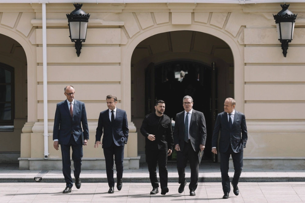 German Chancellor Friedrich Merz, French President Emmanuel Macron, Ukrainian President Volodymyr Zelenskyy, U.K. Prime Minister Keir Starmer and Polish Prime Minister Donald Tusk arrive for a "Coalition of the Willing" news conference at St. Mary's Palace in Kyiv on May 10. German Chancellor Friedrich Merz, French President Emmanuel Macron, Ukrainian President Volodymyr Zelenskyy, U.K. Prime Minister Keir Starmer and Polish Prime Minister Donald Tusk arrive for a "Coalition of the Willing" news conference at St. Mary's Palace in Kyiv on May 10.