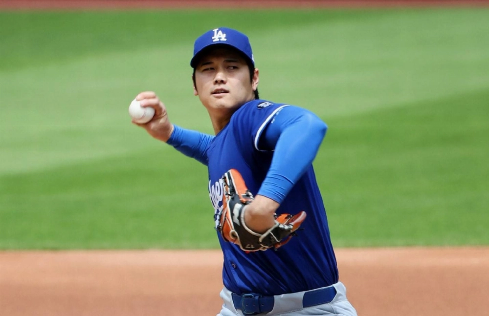 The Dodgers' Shohei Ohtani pitches during a live bullpen session at Citi Field in New York on Sunday. The Dodgers' Shohei Ohtani pitches during a live bullpen session at Citi Field in New York on Sunday.