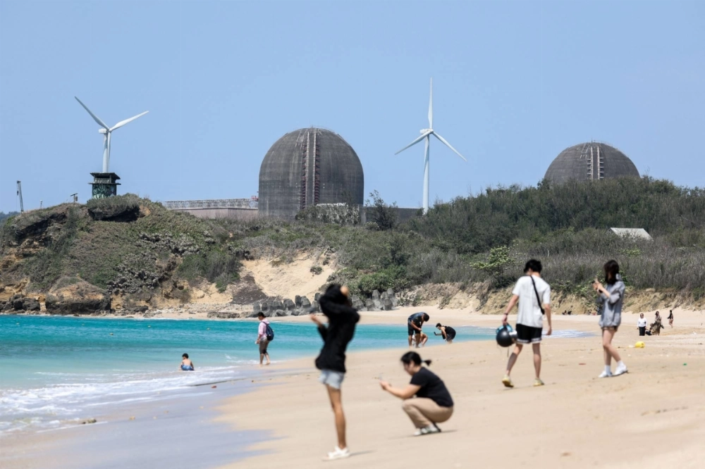 The Maanshan Nuclear Power Plant, which was shuttered last week, is seen from a beach in Pingtung, southern Taiwan, on April 29. The Maanshan Nuclear Power Plant, which was shuttered last week, is seen from a beach in Pingtung, southern Taiwan, on April 29.