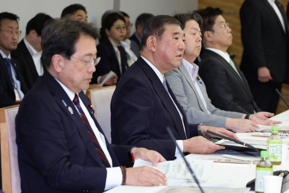 Prime Minister Shigeru Ishiba speaks at a meeting of the government's advisory Council on Economic and Fiscal Policy on Monday at the Prime Minister's Office in Tokyo.  Prime Minister Shigeru Ishiba speaks at a meeting of the government's advisory Council on Economic and Fiscal Policy on Monday at the Prime Minister's Office in Tokyo.