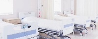 The ruling Liberal Democratic Party-Komeito coalition and Nippon Ishin no Kai have agreed to remove up to 110,000 redundant hospital beds across the country. | Getty Images