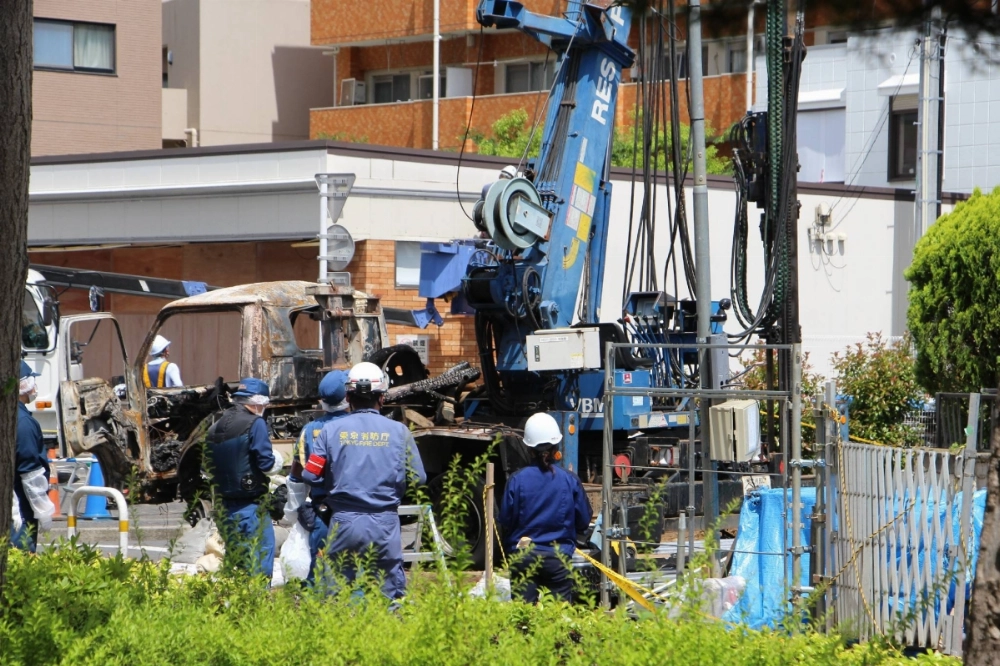 Investigators inspect a construction site in Tokyo's Edogawa Ward on May 28 after an explosion occurred there a day earlier. Investigators inspect a construction site in Tokyo's Edogawa Ward on May 28 after an explosion occurred there a day earlier.