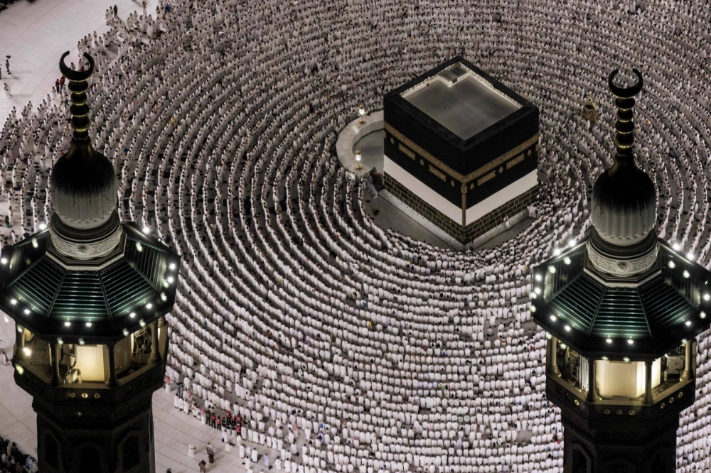 Muslim worshipers gather to pray around the Kaaba, Islam's holiest shrine, at the Grand Mosque complex in the holy city of Mecca on Sunday ahead of the annual Hajj pilgrimage. Muslim worshipers gather to pray around the Kaaba, Islam's holiest shrine, at the Grand Mosque complex in the holy city of Mecca on Sunday ahead of the annual Hajj pilgrimage.
