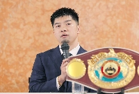 Kosei Tanaka speaks during a news conference to announce his retirement in Nagoya on Wednesday. | JIJI