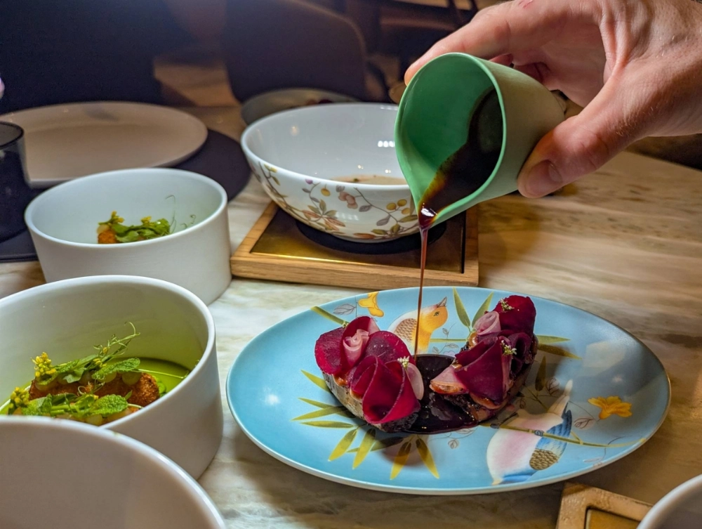 The Eggplant, Trang Pepper and Mole dish encapsulates Igniv Bangkok's philosophy of weaving Thai ingredients into its creative Swiss food. The Eggplant, Trang Pepper and Mole dish encapsulates Igniv Bangkok's philosophy of weaving Thai ingredients into its creative Swiss food.