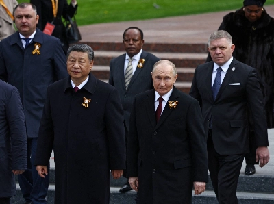 Officials and government leaders including Russian President Vladimir Putin (center right) and Chinese President Xi Jinping (center left) attend a ceremony at the Tomb of the Unknown Soldier on Victory Day, marking the 80th anniversary of the victory over Nazi Germany in World War Two, in Moscow on May 9. Officials and government leaders including Russian President Vladimir Putin (center right) and Chinese President Xi Jinping (center left) attend a ceremony at the Tomb of the Unknown Soldier on Victory Day, marking the 80th anniversary of the victory over Nazi Germany in World War Two, in Moscow on May 9.