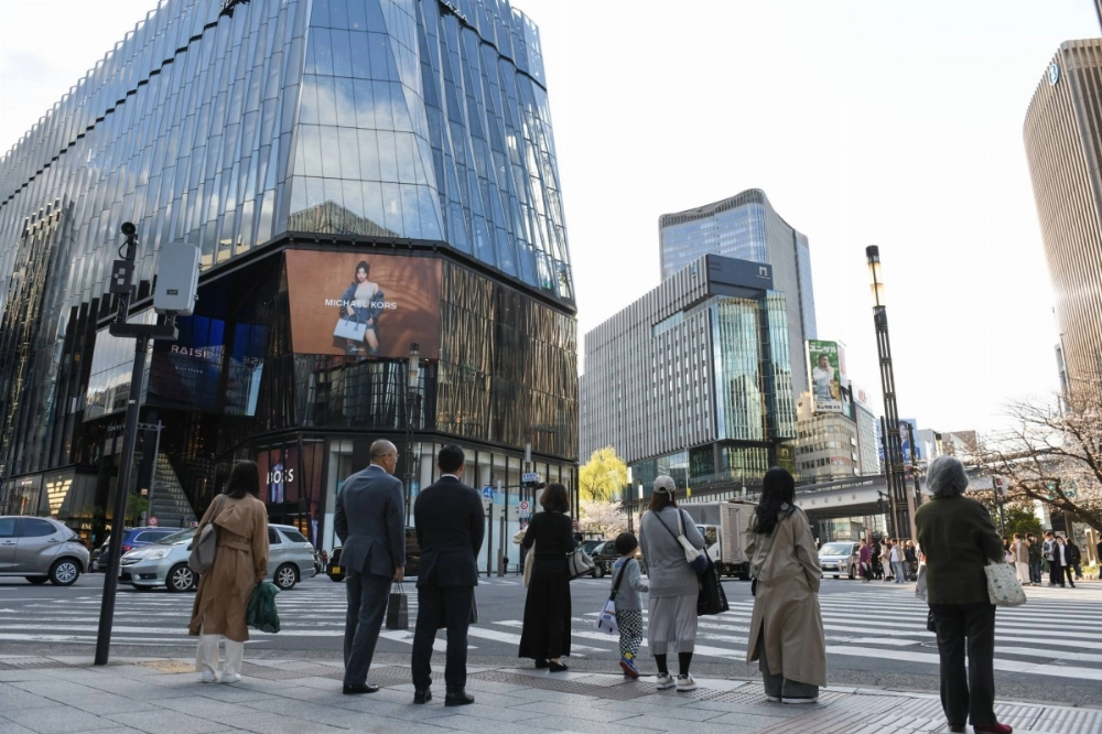 Japan's gross domestic product shrank at an annualized pace of 0.2% in the three months through March, the revised data showed, confirming the country's economy shrank even before U.S. President Donald Trump amped up tariff pressure in April. Japan's gross domestic product shrank at an annualized pace of 0.2% in the three months through March, the revised data showed, confirming the country's economy shrank even before U.S. President Donald Trump amped up tariff pressure in April.