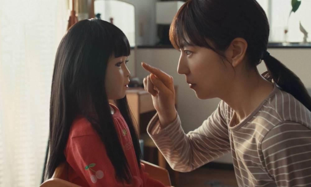 In “Dollhouse,” a grieving mother (Masami Nagasawa) finds comfort in an old doll that resembles her deceased child, until the toy starts wreaking havoc on her family.  In “Dollhouse,” a grieving mother (Masami Nagasawa) finds comfort in an old doll that resembles her deceased child, until the toy starts wreaking havoc on her family.